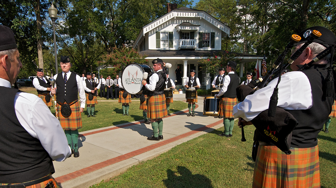 Atlanta Bagpipe Band perform at a September 11 Remembrance ceremony on the Alumni House Lawn