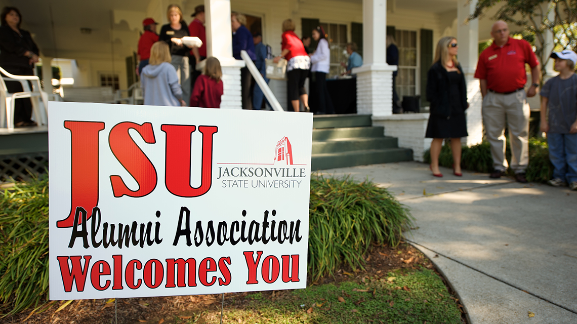 Sign welcoming Alumni to Alumni House