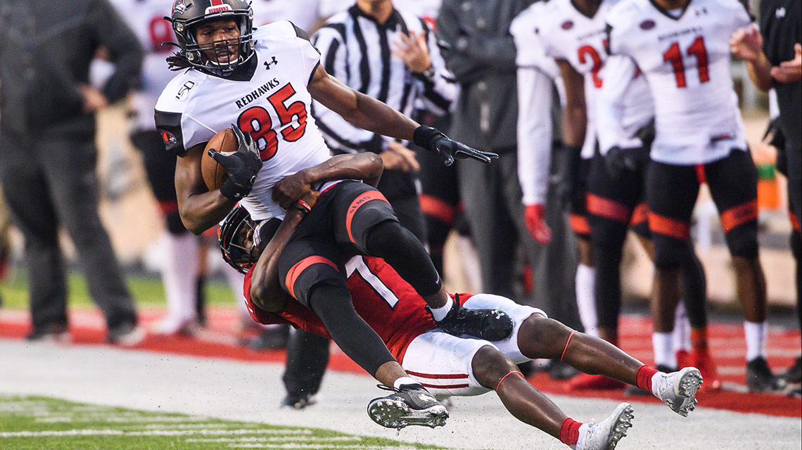 A JSU Gamecock takes down a SEMO player during a tackle in the homecoming game