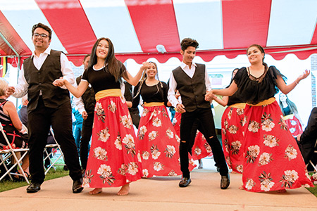 Students dance at UN Day Tea