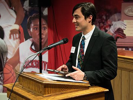 Student Speaking at Podium