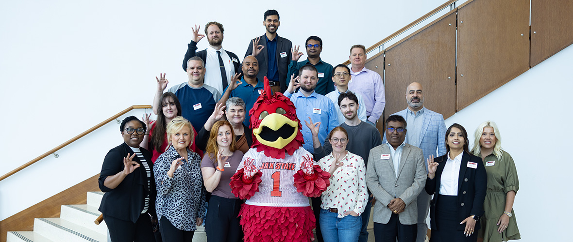 Faculty smiling