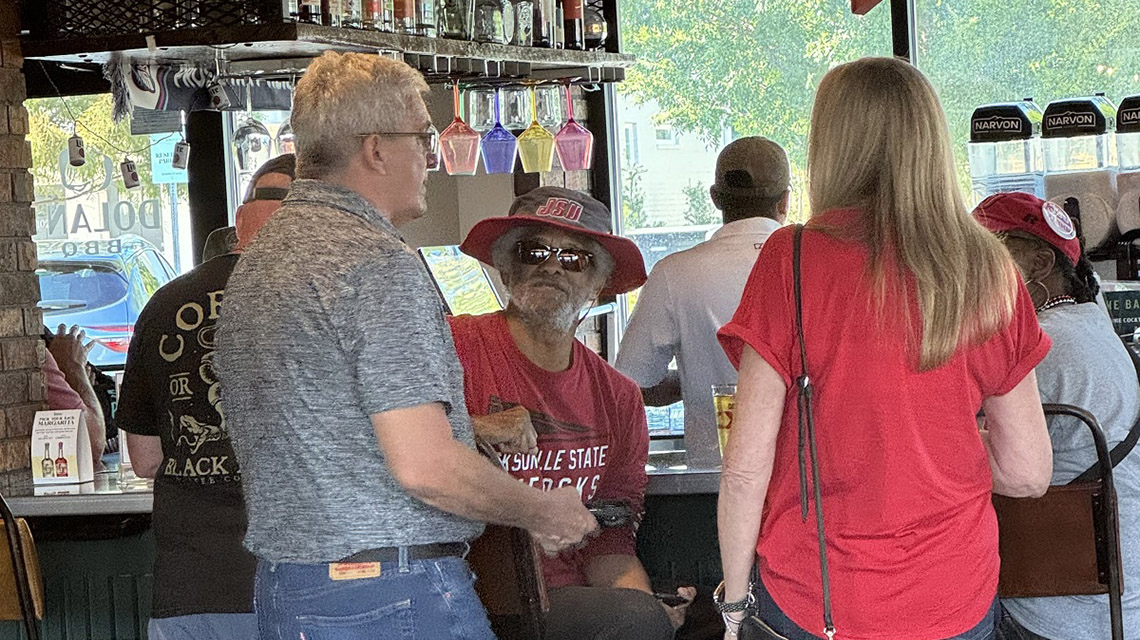 Alumni and friends gather before the game in Statesboro