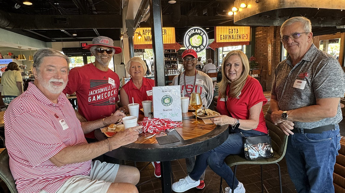 Alumni and friends gather before the game in Statesboro