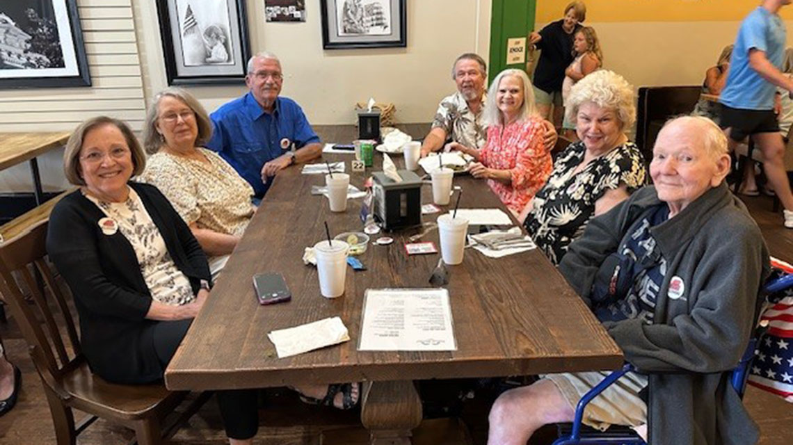 A group poses for a photo at Lunch Bunch in Cartersville, GA