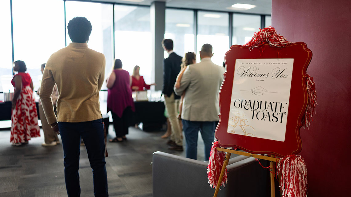 the welcome sign for the graduate toast