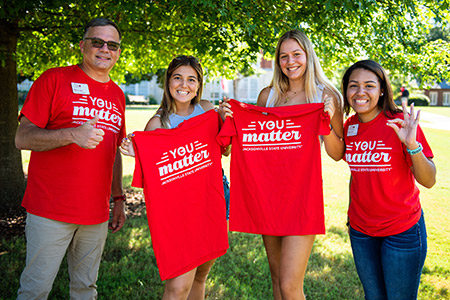 JSU Employees holding up You Matter t-shirts