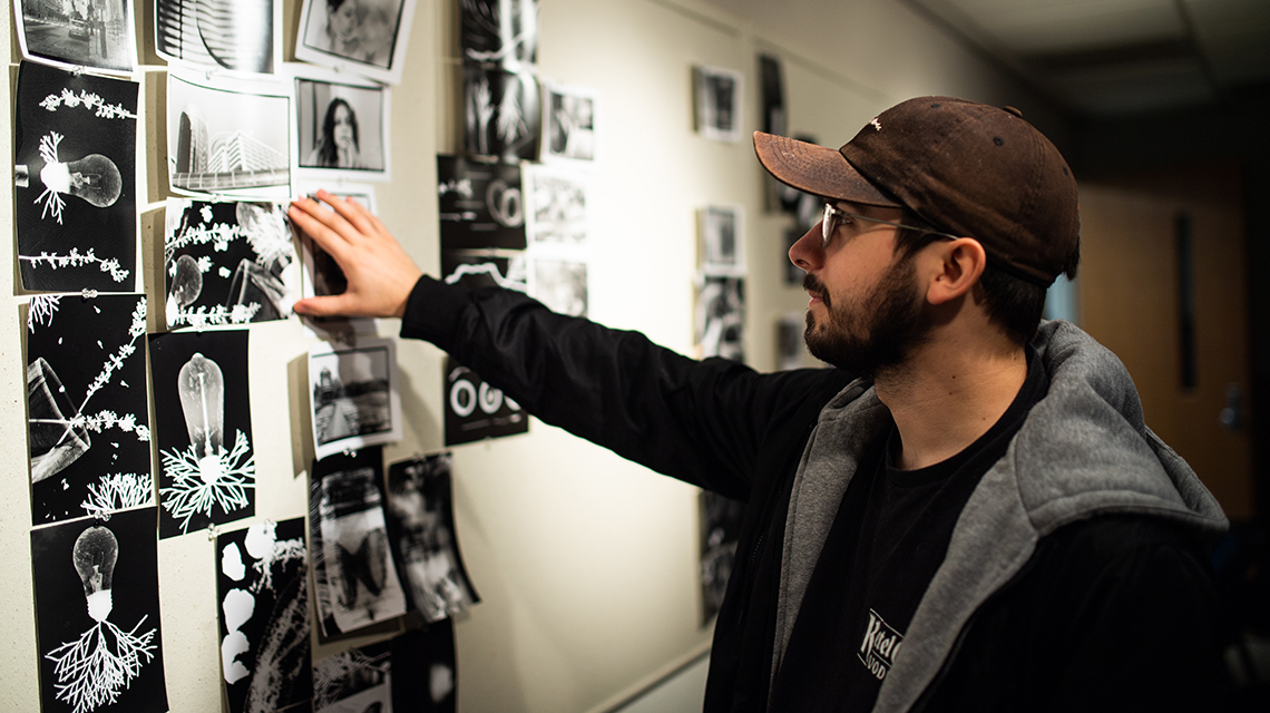 Student viewing darkroom images 