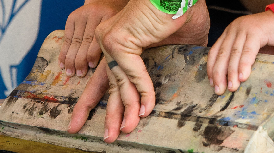 Up close of hands Screen Printing