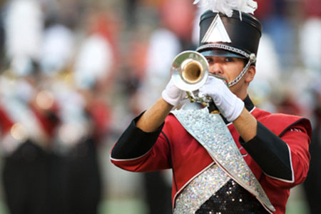 trumpet player on the field