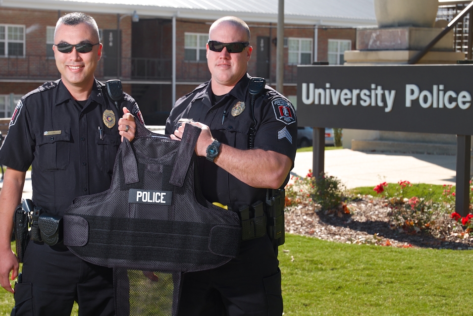 Police holding vest