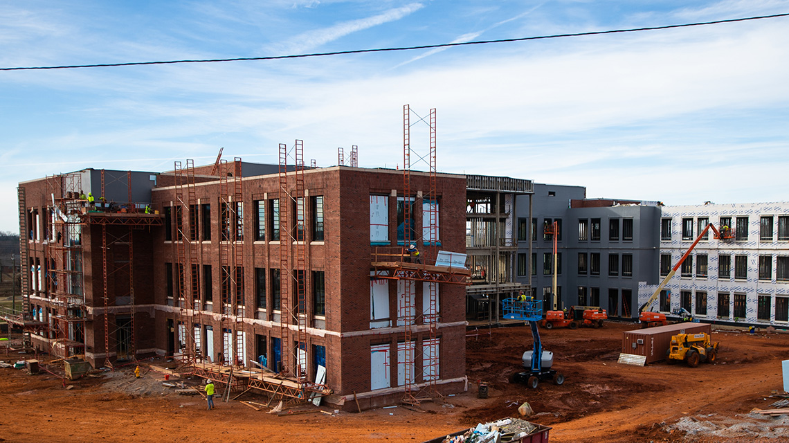 Closer view of rear facade, showing courtyard area