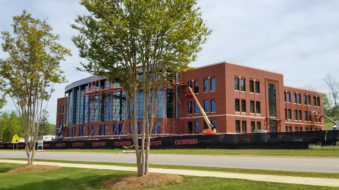 View of the front of the new Merrill Hall, taken in April 2021, from the west side of Pelham Road