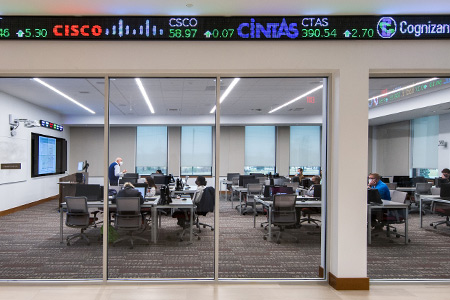 the stock ticker outside a classroom in Merrill Hall