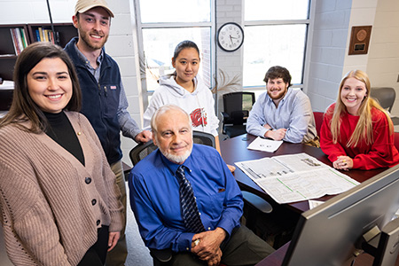 students and dr gene padgham invest real money in the stock market