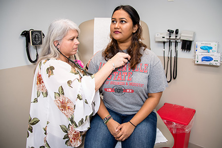 Nurse and CBI student at Student Health Center