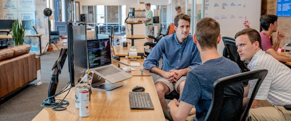 People sitting around desk