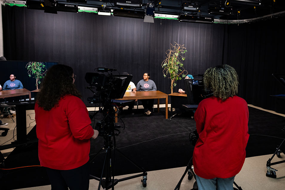 student being filmed in studio