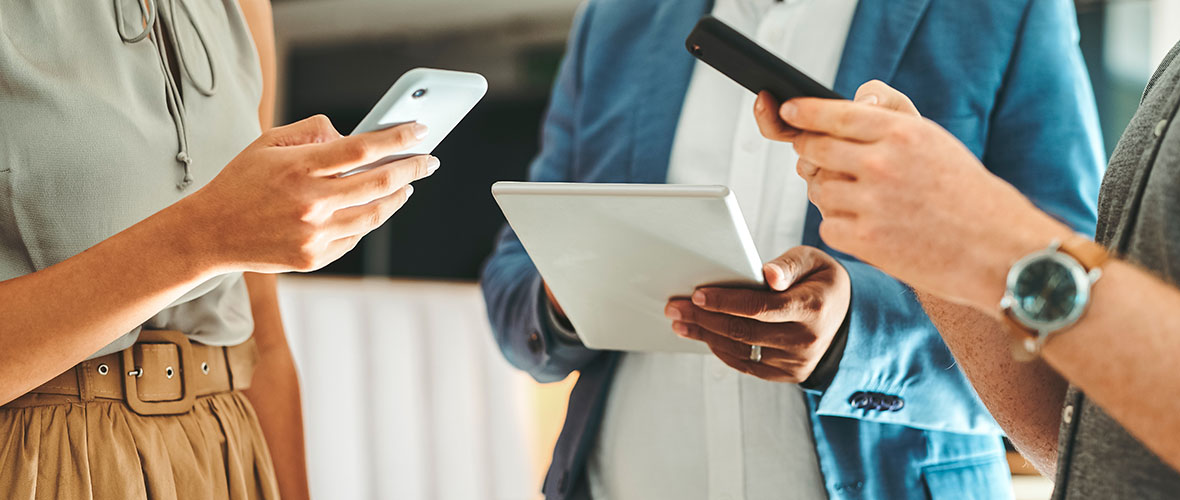 Several people using mobile devices