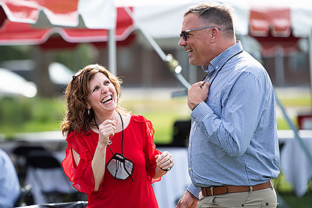 Dr. Shelton and Dr. Casey smiling at faculty event