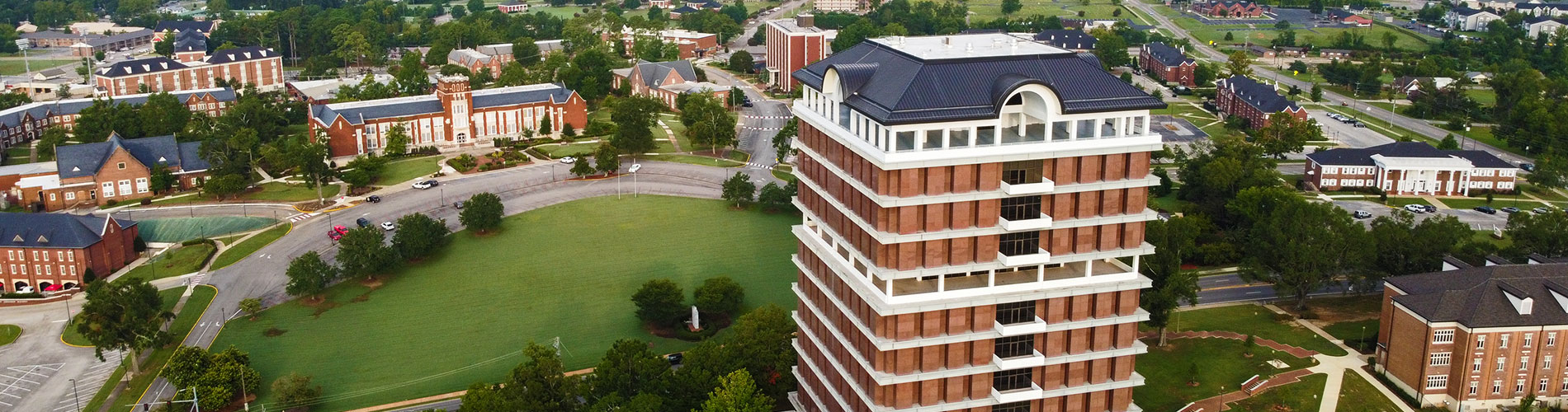 Aerial view of campus with the library and Angle Hall in the foreground