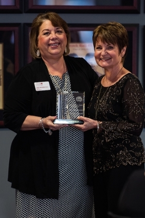 Ms. Robbie Boggs accepting for Dr. Goodwin