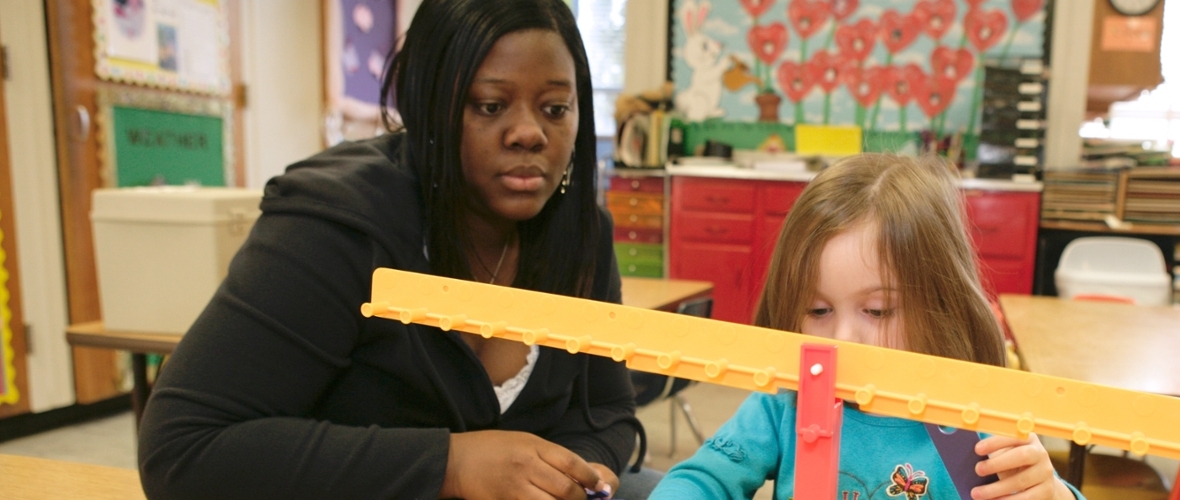Teacher with student