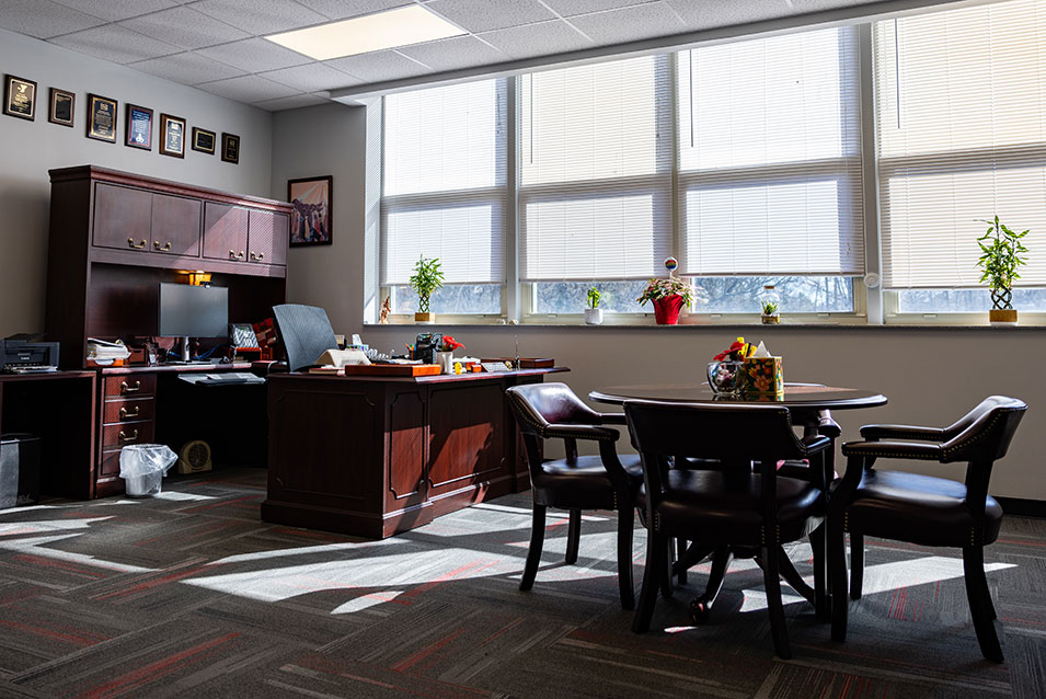 An empty education leader's office in the afternoon sun.