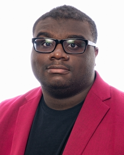 Headshot of Christian Thomas.