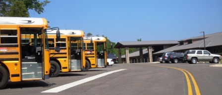 School buses lined up outside the Canyon Center