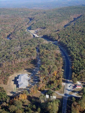aerial view of Canyon Center including road to highway