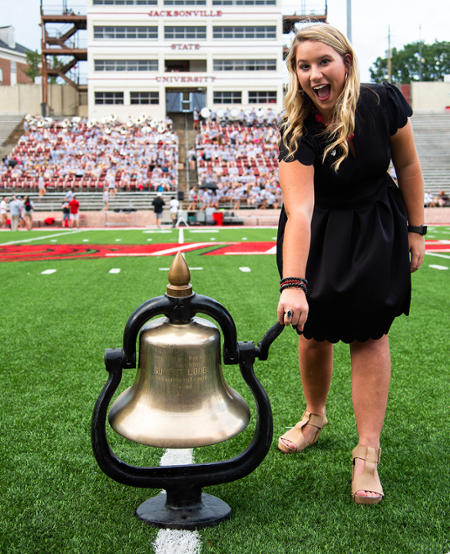 Freshman ringing the bell at convocation