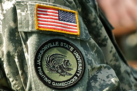 A military jacket with a JSU patch on the sleeve