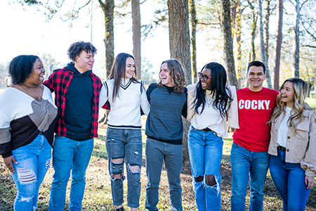 Students in a group outside on campus