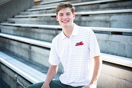 A student sitting in JSU Stadium