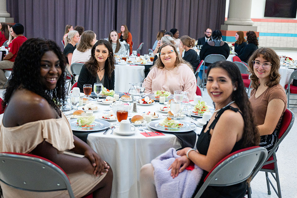 students participate in the first-generation dinner