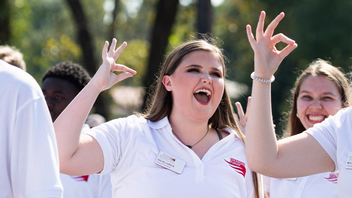 Freshman Forum members march in a JSU parade