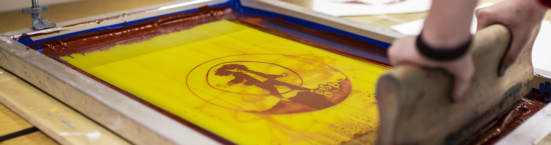close up of student screen printing project 