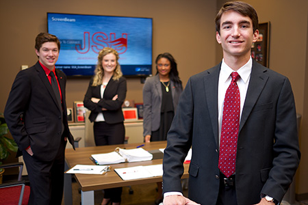 Business students in boardroom