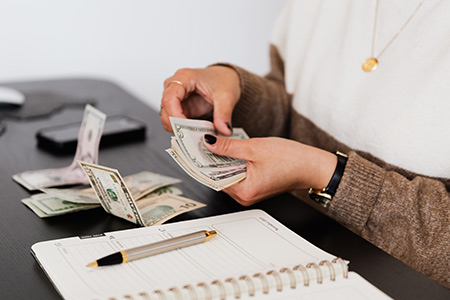 person counting money