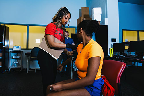 Student on exercise equipment