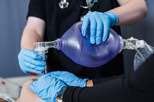 Respiratory Therapy student practices on simulation mannequin