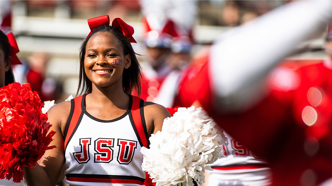 A JSU cheerleader gets the crowd fired up