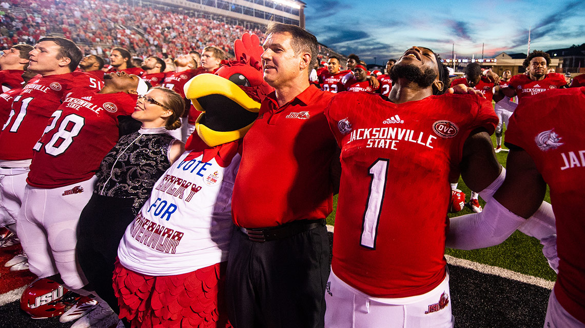 The Gamecocks and Coach John Grass celebrate their victory over Austin Peay with the traditional song I'll Fly Away