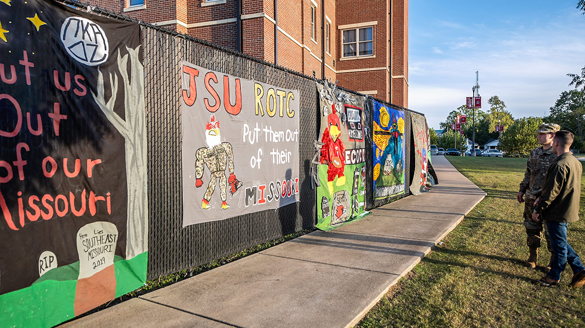 Students view the homecoming banners at the Shrimp Boil