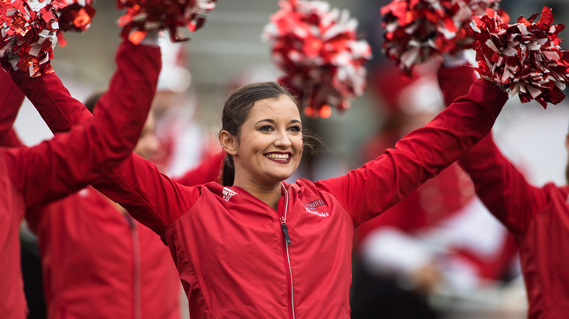 Cheerleaders with pom poms