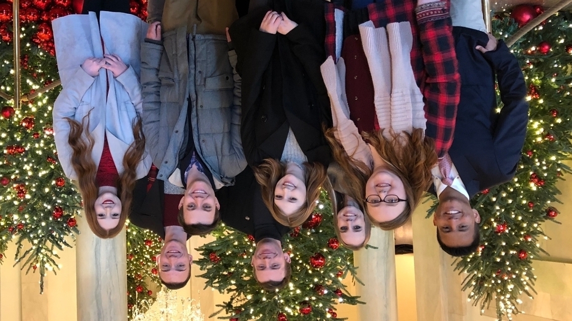 Students in front of The White House Christmas trees