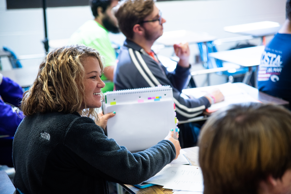 Students sitting at table