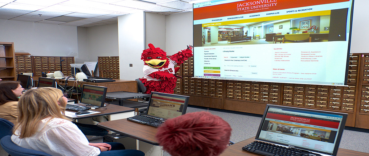 Cocky providing library instruction to students in the Library's Instruction Lab