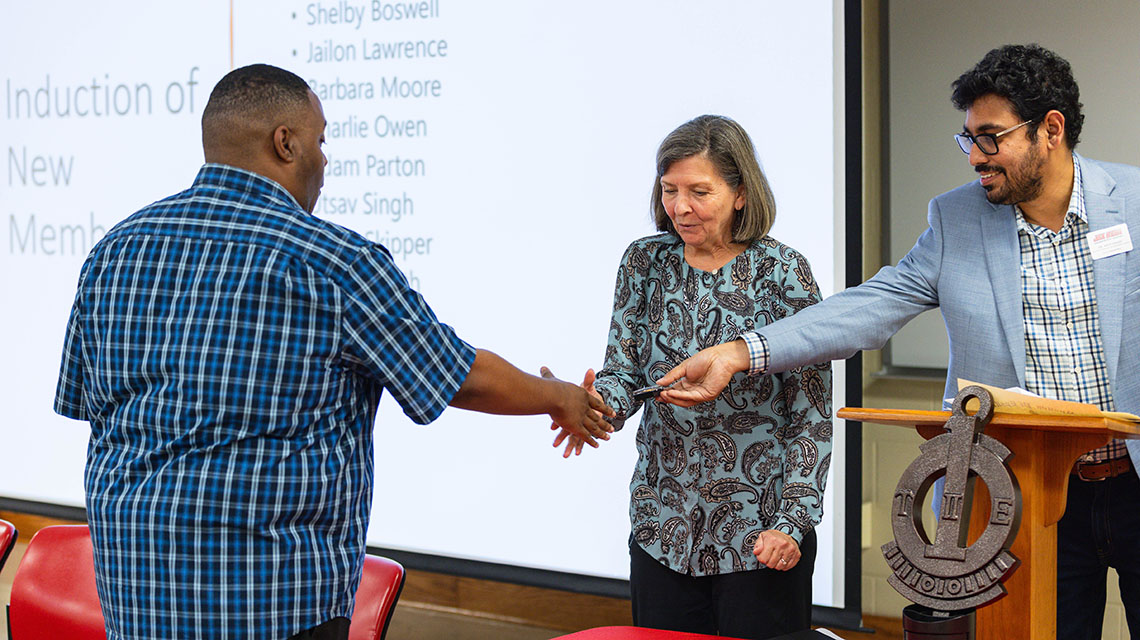 Student receiving his certificate